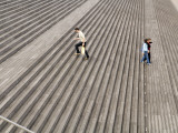 People on Steps of National Bibliotheque (Library) in Gare De Lyon Impressão fotográfica por Will Salter People on Steps of National Bibliotheque (Library) in Gare De Lyon Impressão fotográfica por Will Salter