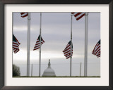 Flags at the Washington Monument Fly at Half Staff Framed Photographic Print by Gerald Herbert