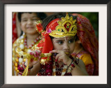 A Child Enacts the Life of Hindu God Krishna During Janamashtami Celebrations Framed Photographic Print