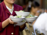 Waitress Carrying Soup in Wangfujing Xianchi Jie, Small Hutong Photographie par Ray Laskowitz