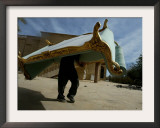 An Iraqi Man Trudges Under the Weight of a Couch He Looted from a Gated Elite Housing Compound Framed Photographic Print