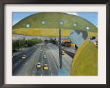 Main Avenue is Empty of Private Cars, Seen from a Bridge Decorated with a Statue of a Pedestrian Framed Photographic Print