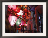 A Lantern Vendor Displays Her Silk Lanterns to a Tourist During the Full Moon Festival Framed Photographic Print