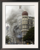 Smoke Blows Out from the Landmark Taj Mahal Hotel in Mumbai, India Framed Photographic Print