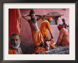 Hindu Holy Men Relax after Taking Holy Dip in River Ganges During the Kumbh Mela Festival in India Framed Photographic Print