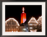 A Huge Christmas Candle Appears Above the Roofs in the Old City of Schlitz, Germany Framed Photographic Print by Heribert Proepper