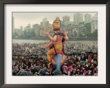 A Crowd of Revellers Carry a Statue of Ganesh Framed Photographic Print