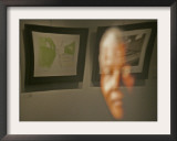 Lithograph by Nelson Mandela is Seen Reflected on a Photographic Portrait of Mandela Framed Photographic Print