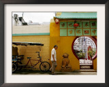 An Unidentified Chinese Man Walks Past the Cuban Wushu Association of Havana's Chinatown Framed Photographic Print