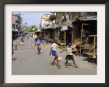 Children Play Soccer on One of the Streets of the Business District of Lagos Framed Photographic Print