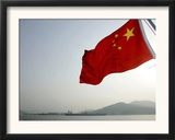 A Chinese Flag Flutters Framed Photographic Print