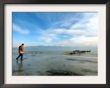 A Man Walks on the Ice-Covered Southeastern Macedonian Dojran Lake Framed Photographic Print