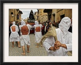 Several Masked Penitents Beats Their Backs During "Los Picaos" Brotherhood Procession Framed Photographic Print