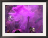 People Painted with Bright Colors Dance During the Festival of Holi on March 7, 2004 Framed Photographic Print by Anupam Nath