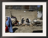 Afghan Street Vendor Speaks with Friend as He Sells Mulberry Pea Nuts and Sun Flower Seeds in Kabul Framed Photographic Print