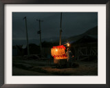 A Boy Prepares to Sell Bread Framed Photographic Print