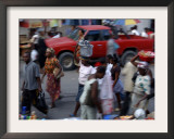 An Water Vendor Walks in the Streets of Port-Au-Prince, Haiti Framed Photographic Print