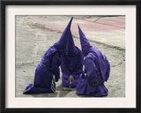 Cucuruchos Pray Before an Easter Procession Framed Photographic Print