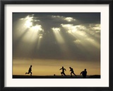 Iraqi Kurdish Boys Play Football as the Sun Sets Framed Photographic Print