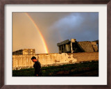 An Afghan Man Walks Past Destroyed Buildings Occupied by Refugees after a Heavy Rain Framed Photographic Print