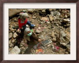 A Lebanese Woman Try to Salvage Some Belongings Amongst the Rubble of Their House Framed Photographic Print