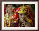 A Child Enacts the Life of Hindu God Krishna During Janamashtami Celebrations Framed Photographic Print