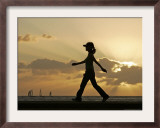 Sunset Walker, Honolulu, Hawaii Framed Photographic Print by Marco Garcia