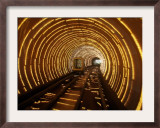 An Empty Tourist Subway Car Runs Through Illuminated Tunnel Framed Photographic Print