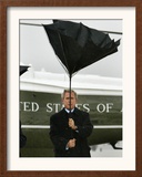 President Bush Jokingly Holds His Wind-Blown Umbrella Upright Framed Photographic Print
