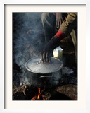 A Man, 24, from Ghana, Prepares His Meal Framed Photographic Print