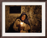 Elderly Woman Holds a Candle as She Takes Part in a Procession During Holy Week in Taxco, Mexico Framed Photographic Print