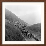 Contestants in the Grueling Tour De France are Seen on Their Way to the Mente Pass Framed Photographic Print