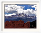The Sun Breaks Through the Clouds to Highlight the Summit of Pikes Peak Framed Photographic Print
