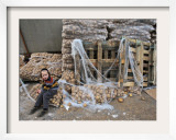 Ultra-Orthodox Jewish Child Sits Next to Piles of Potatoes, Preparations for Upcoming Passover Framed Photographic Print