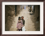 In an Alley While Waiting for the Rest of their Friends in a Poor Neighborhood in Pakistan Framed Photographic Print