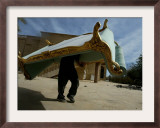 An Iraqi Man Trudges Under the Weight of a Couch He Looted from a Gated Elite Housing Compound Framed Photographic Print