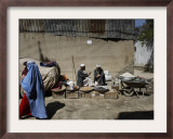 Afghan Street Vendor Speaks with Friend as He Sells Mulberry Pea Nuts and Sun Flower Seeds in Kabul Framed Photographic Print