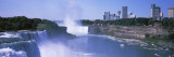 Waterfall With City Skyline in The Background, Niagara Falls, Ontario, Canada Wall Decal by  Panoramic Images