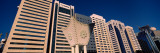 Sculpture in Front of Skyscrapers, Al-Ittihad Square, Abu Dhabi, United Arab Emirates Vinilos decorativos por Panoramic Images Sculpture in Front of Skyscrapers, Al-Ittihad Square, Abu Dhabi, United Arab Emirates Vinilos decorativos por Panoramic Images