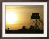 Camp Warhorse Guard Tower at Sunset Prints by Stocktrek Images 
