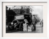 Prohibition, a Policeman Standing Alongside a Wrecked Car and Cases of Moonshine, November 16, 1922 Poster