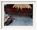 A Beggar Sleeps Next to a Bakery in Kabul, Afghanistan, Wednesday, June 7, 2006 Framed Photographic Print by Rodrigo Abd