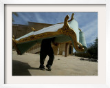 An Iraqi Man Trudges Under the Weight of a Couch He Looted from a Gated Elite Housing Compound Framed Photographic Print