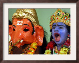 A Child Dressed as Hindu God Krishna Yawns, Chennai, India, September 22, 2006 Framed Photographic Print by M. Lakshman