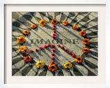 A Makeshift Peace Sign of Flowers Lies on Top John Lennon's Strawberry Fields Memorial Framed Photographic Print