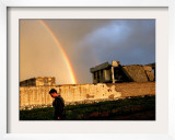 An Afghan Man Walks Past Destroyed Buildings Occupied by Refugees after a Heavy Rain Framed Photographic Print