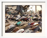 Kashmiri Eartquake Survivors Pray Amid the Debris of a Destroyed Building During the Eid Al-Fitr Framed Photographic Print