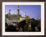 A Shiite Muslim Worshipper Sings the Call for Prayer at the Kadhimiya Shrine Framed Photographic Print