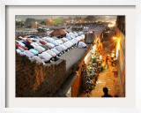 Indian Muslims During Friday Evening Prayers on the Rooftop of a Building over an Auto Parts Market Framed Photographic Print