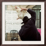 An Ultra Orthodox Man Swings a Live Chicken Over His Head Framed Photographic Print